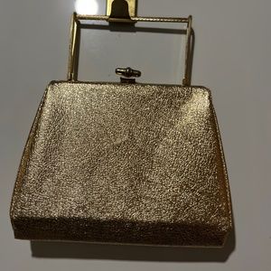 c1950s gold clutch with silk liner